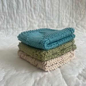 Set of three hand knit dishcloths/washcloths.